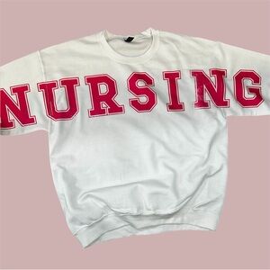 White Nursing Sweatshirt Big Pink Text